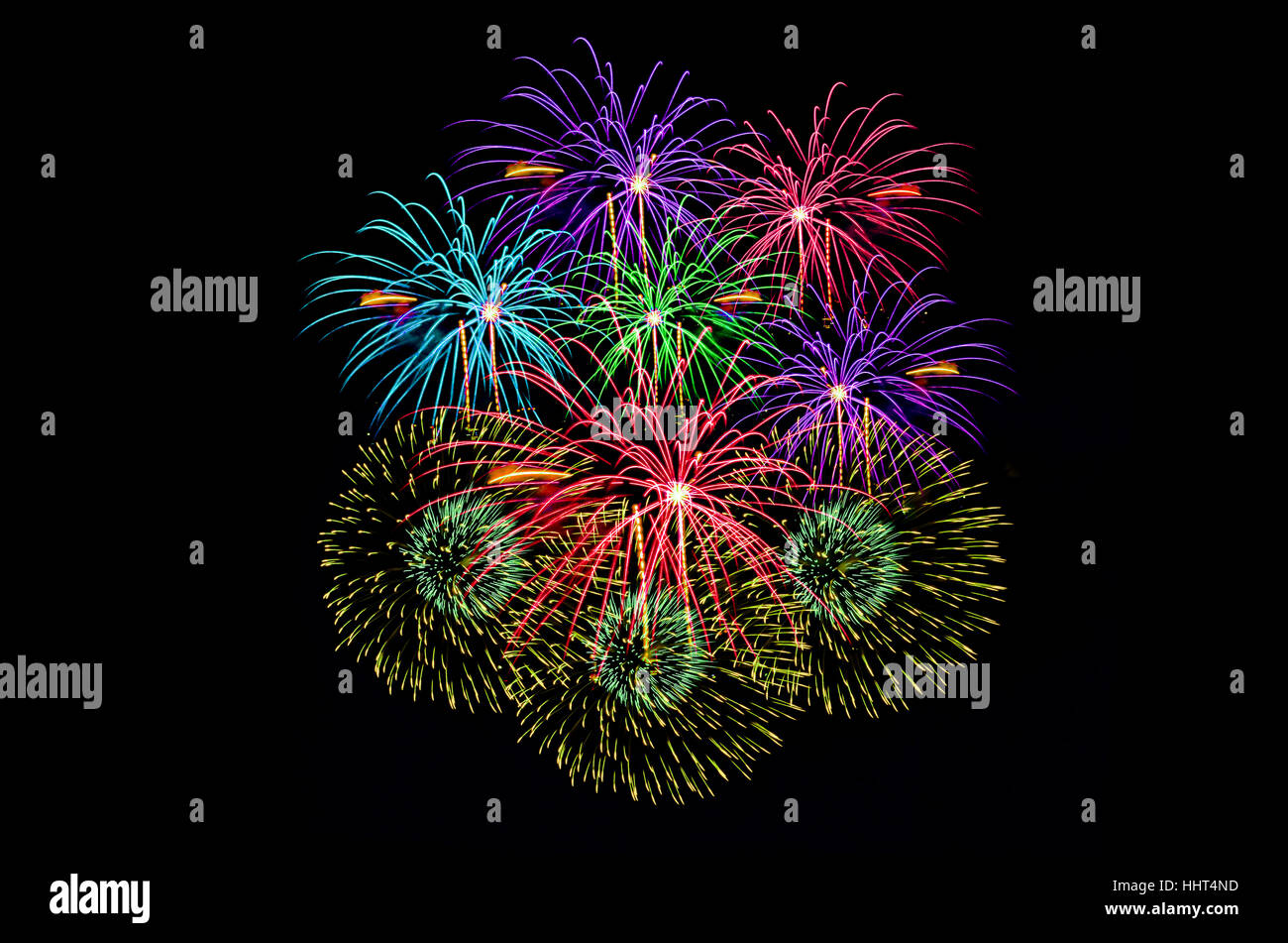 Coloratissimi fuochi d'artificio celebrazione e la mezzanotte sullo sfondo del cielo. Foto Stock