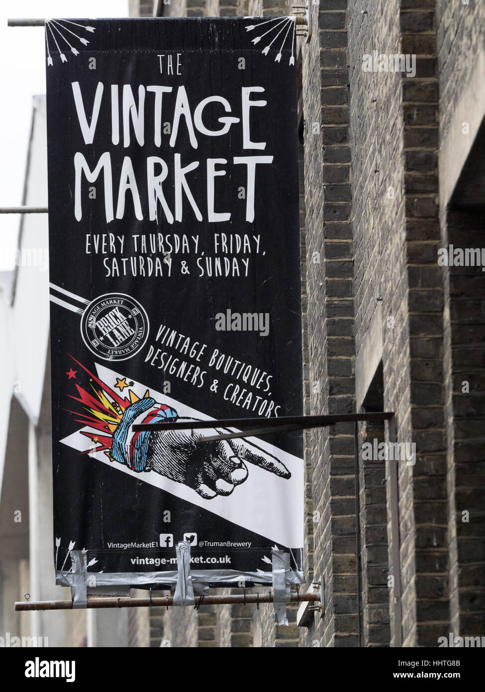 Segno per un mercato Vintage a Brick Lane nell'East End di Londra Foto Stock