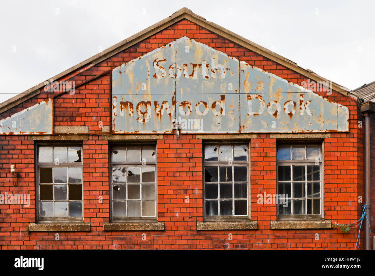 Segno su un edificio industriale su Collingwood Dock Liverpool Foto Stock