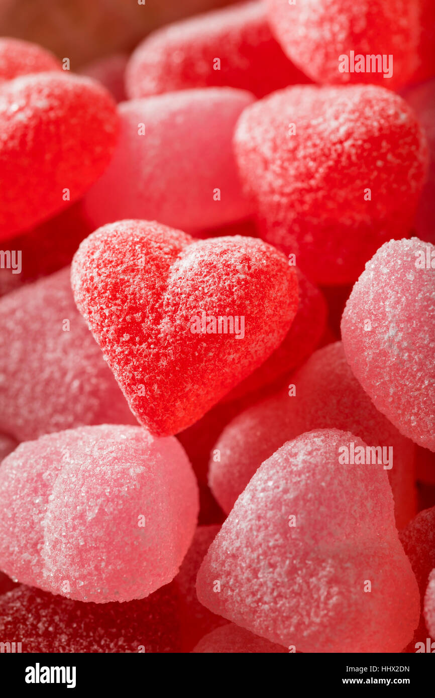 A forma di cuore caramelle di gomma sfondo, amore e il giorno di san  valentino concetto Foto stock - Alamy