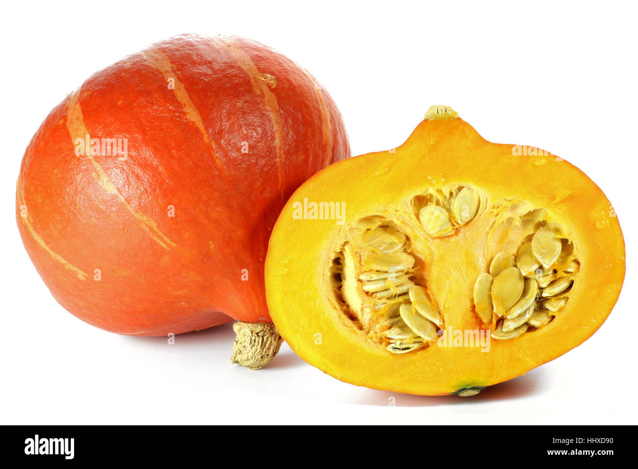 Red kuri squash isolati su sfondo bianco Foto Stock