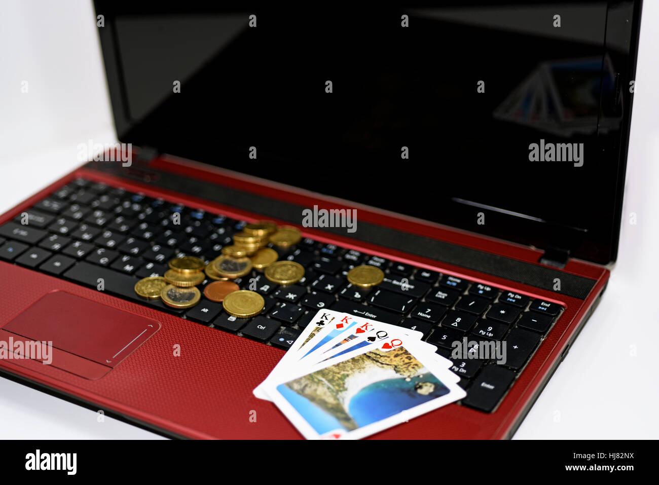 Idea astratta di giocare a poker online. Foto Stock