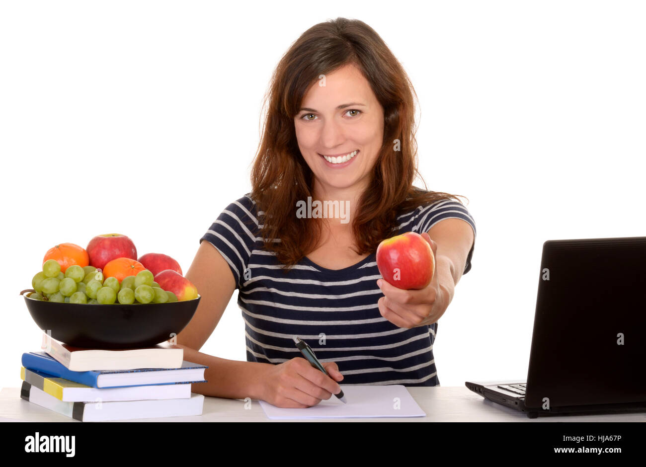 Studente detiene apple e sorrisi Foto Stock