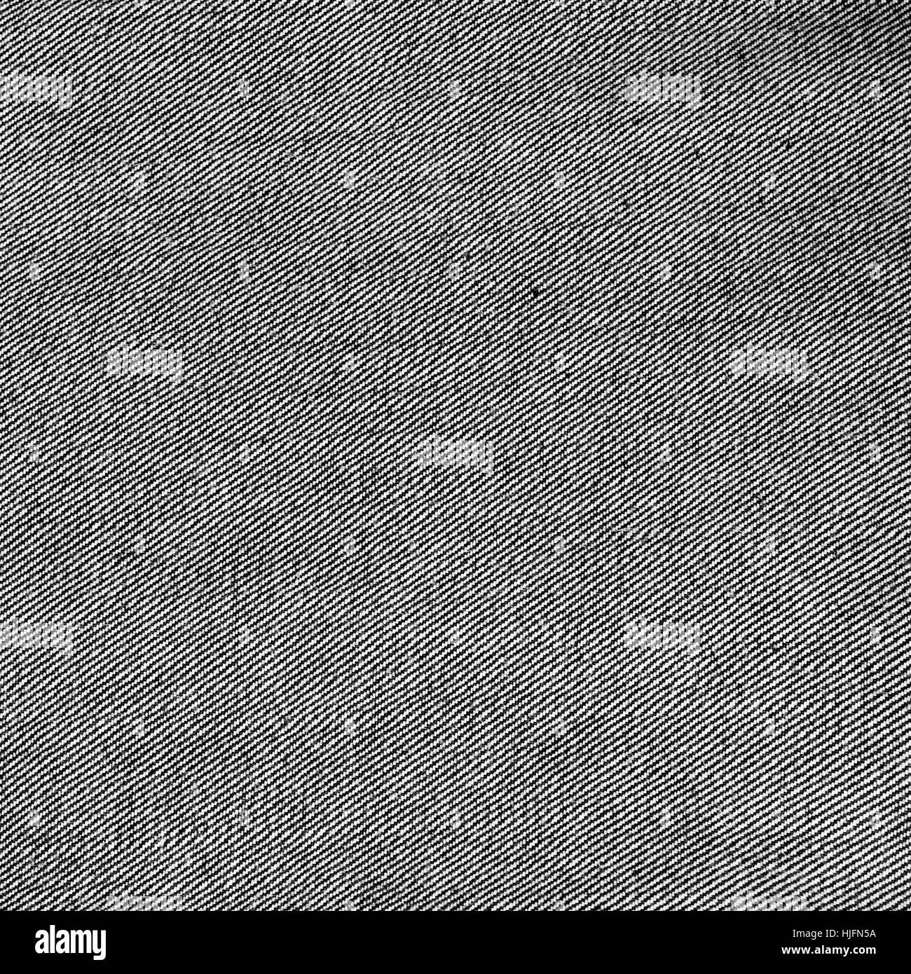 Close-up di nero e di bianco jeans tessuto Foto Stock