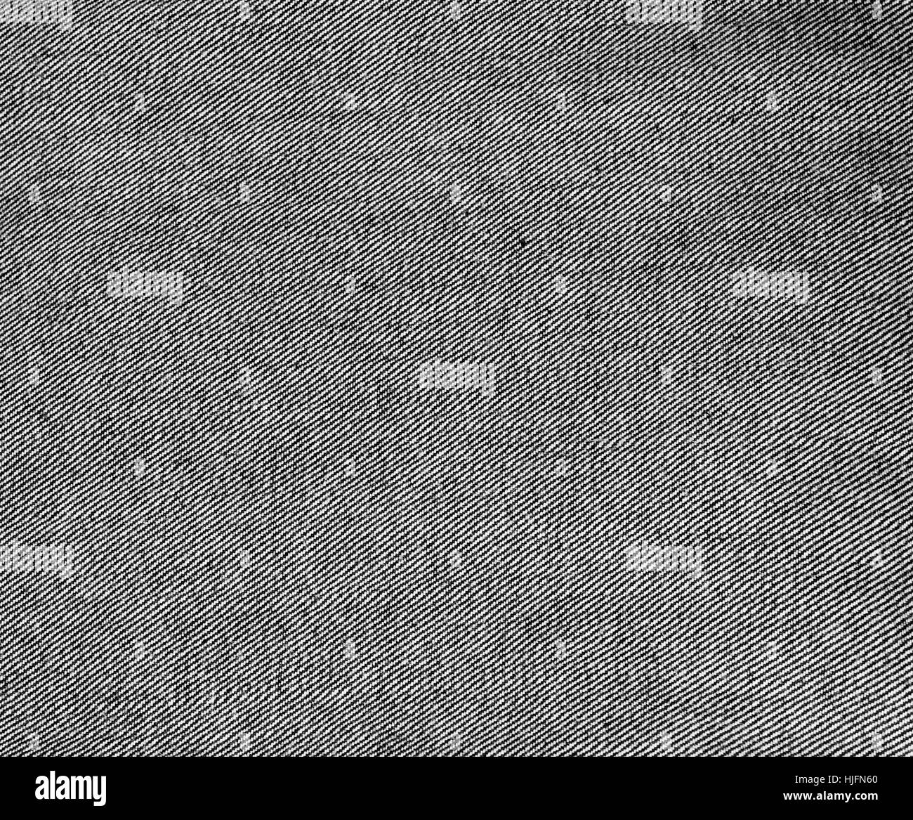 Close-up di nero e di bianco jeans tessuto Foto Stock