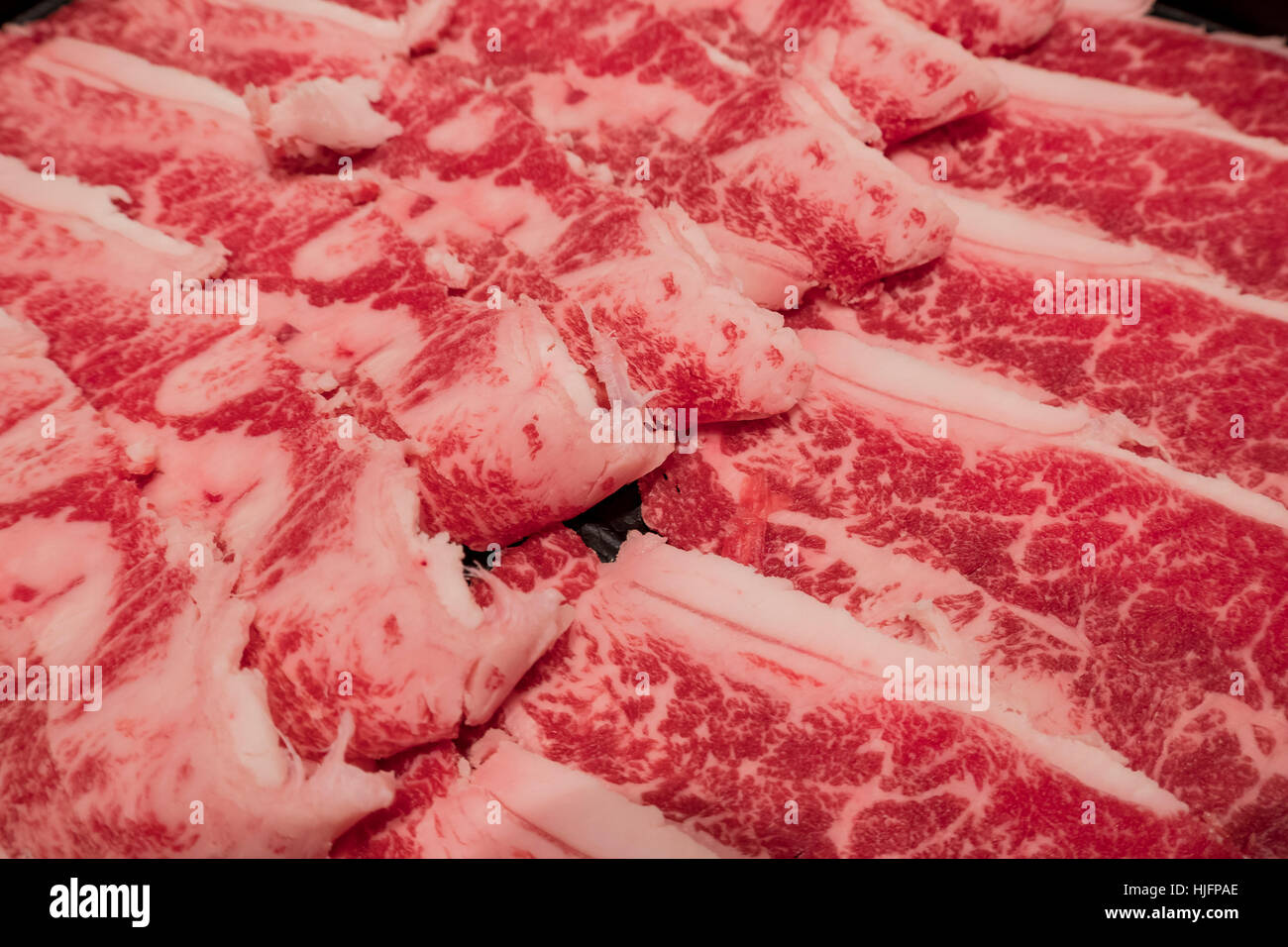 Carne cruda slice preparare da cuocere in una pentola bollente, Taiwan Foto Stock