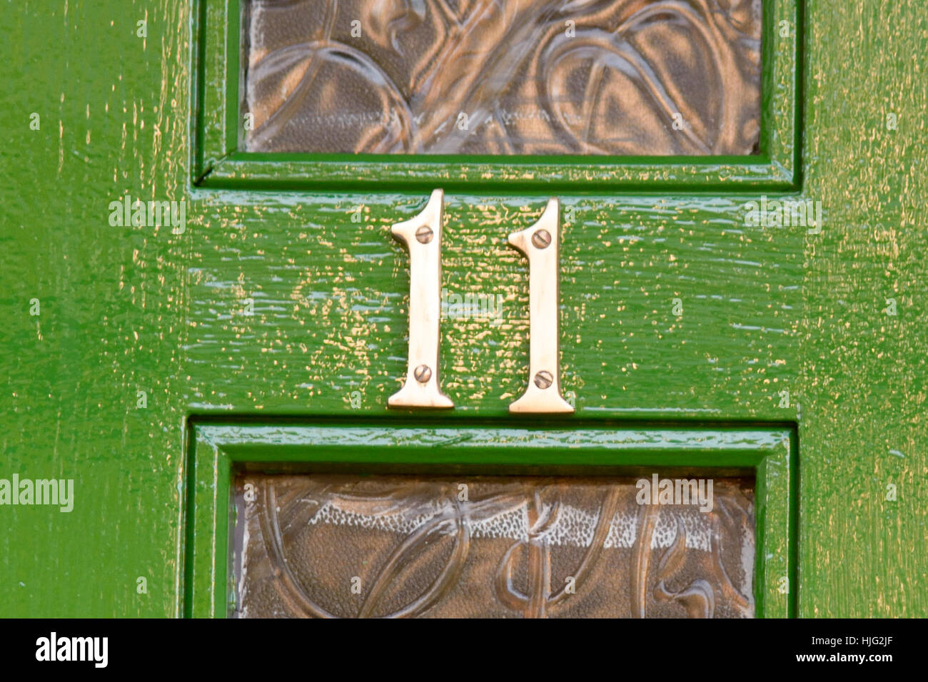 Il numero civico 11 segno sulla porta Foto Stock