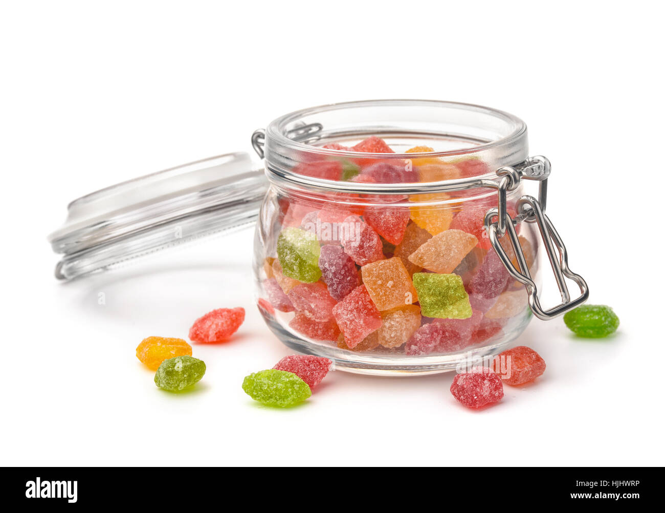 Il vasetto di vetro di duro frutti canditi isolato su bianco Foto Stock