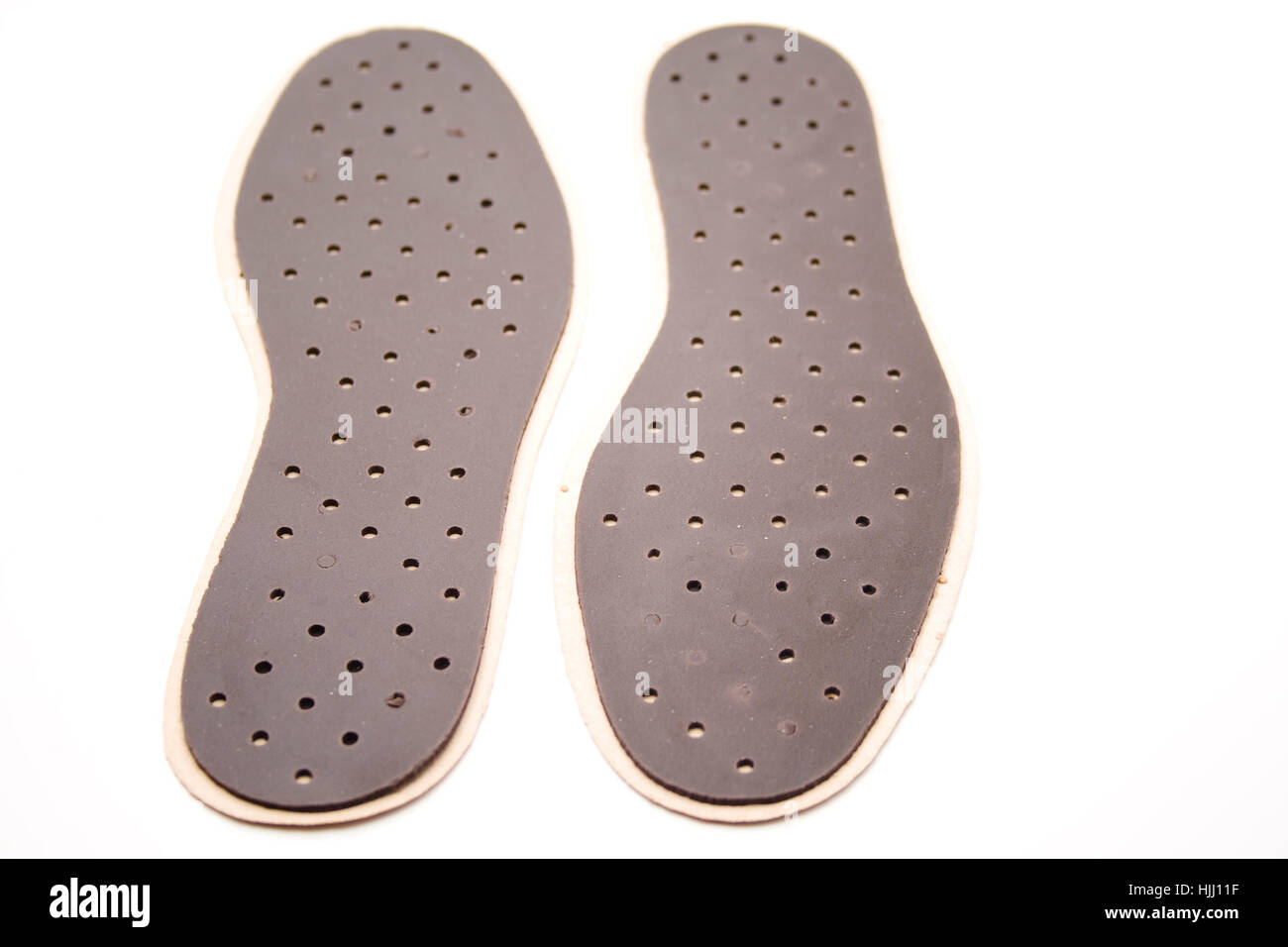 Le scarpe di cuoio, suole, schiuma, scarpe, soft, pelle, conveniente, fori, punch, Foto Stock