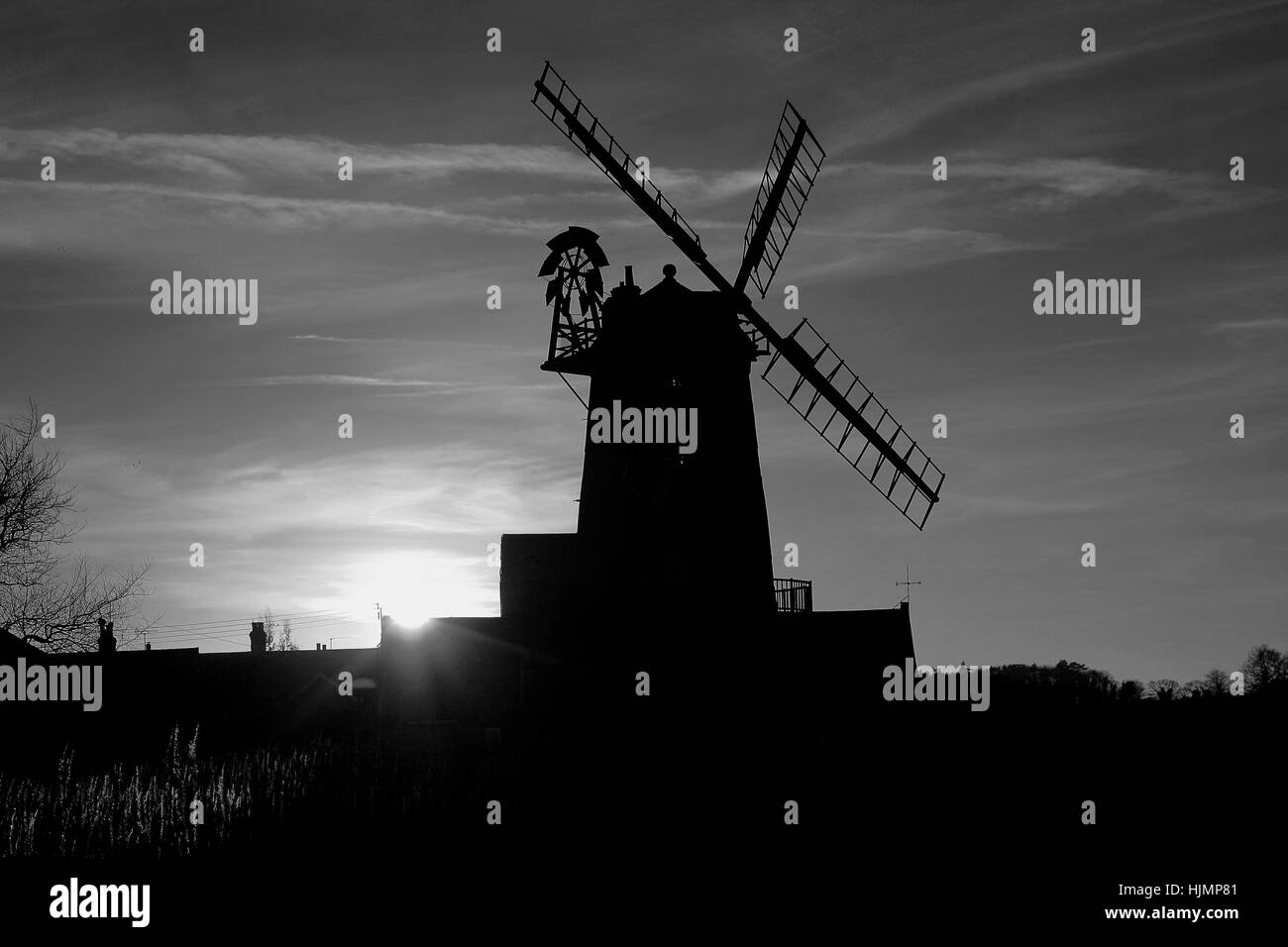 Tramonto, Cley Windmill Cley-next-mare village, Costa North Norfolk, Inghilterra, Regno Unito Foto Stock