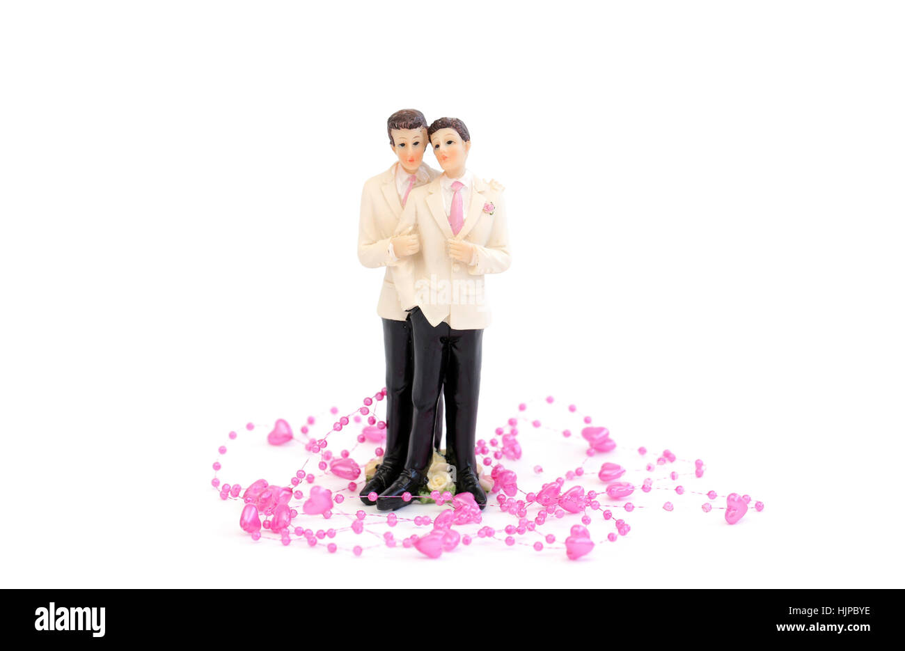Una coppia omosessuale con un po' di Cuori rosa su sfondo bianco Foto Stock