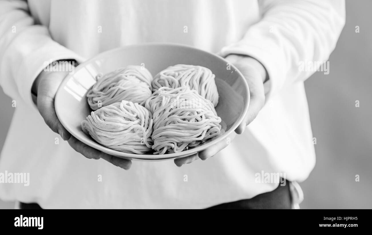 Noodle cinesi Cucina Chopstick cultura concetto Relax Foto Stock