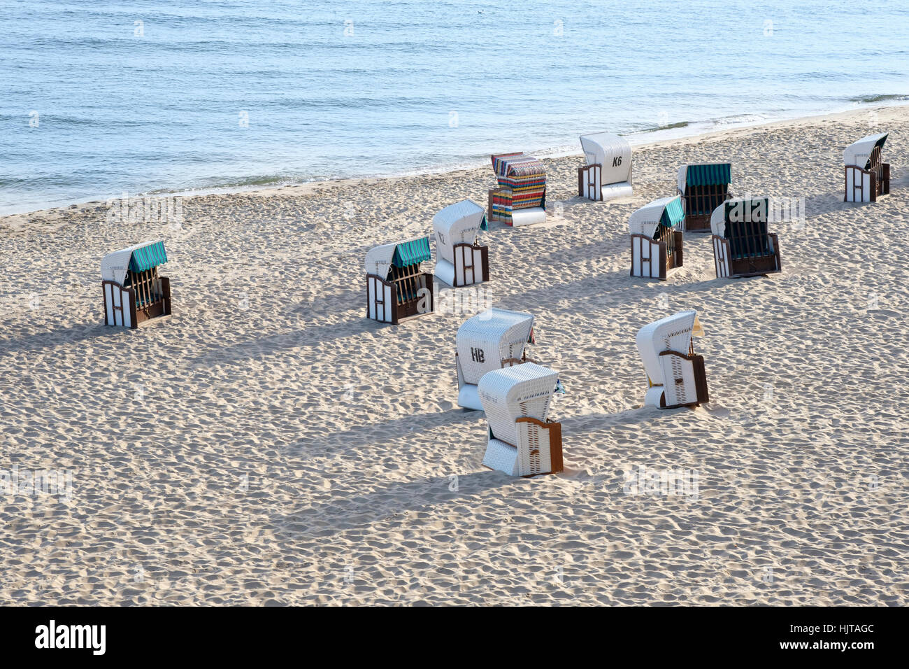 Germania, Usedom, incappucciati sdraio in spiaggia Foto Stock