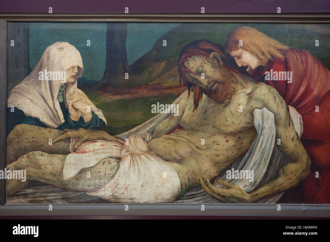 Compianto di Cristo (1512-1516) da artista del Rinascimento tedesco Matthias Grunewald. Pittura nella predella della pala Isenheim (1512-1516) sul display al Musee d'Unterlinden (museo Unterlinden) di Colmar, Alsazia, Francia. Foto Stock