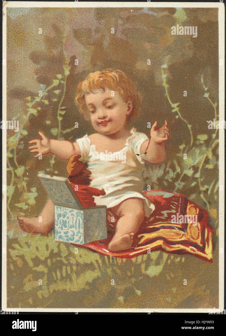Bambino che gioca con un martinetto-in-a-box. Foto Stock