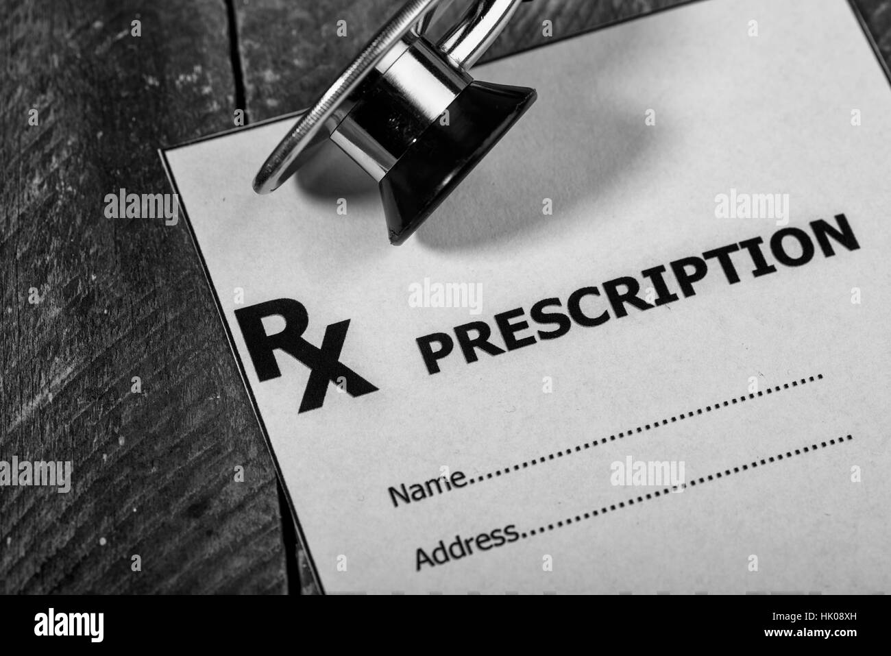 Modulo di prescrizione con uno stetoscopio Foto Stock