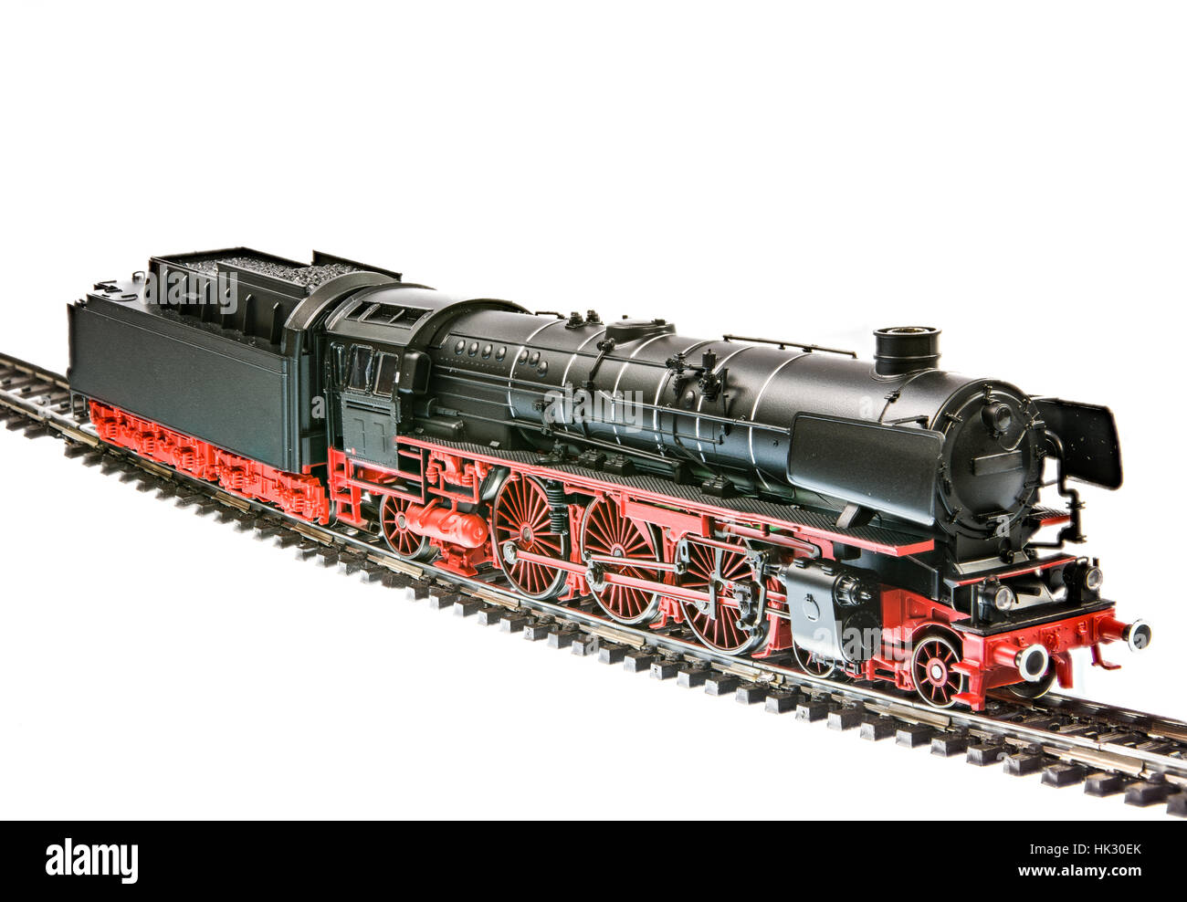 Isolato toy train con un motore a vapore locomotiva Foto Stock