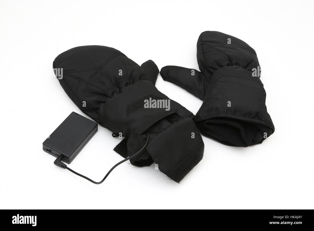 Un paio di guanti neri con azionato a batteria pastiglie di calore Foto Stock