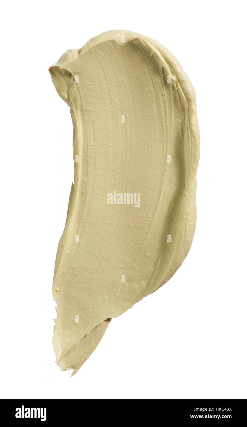 Un taglio fuori bellezza immagine di un campione di verde pallido viso o maschera di fango. Foto Stock
