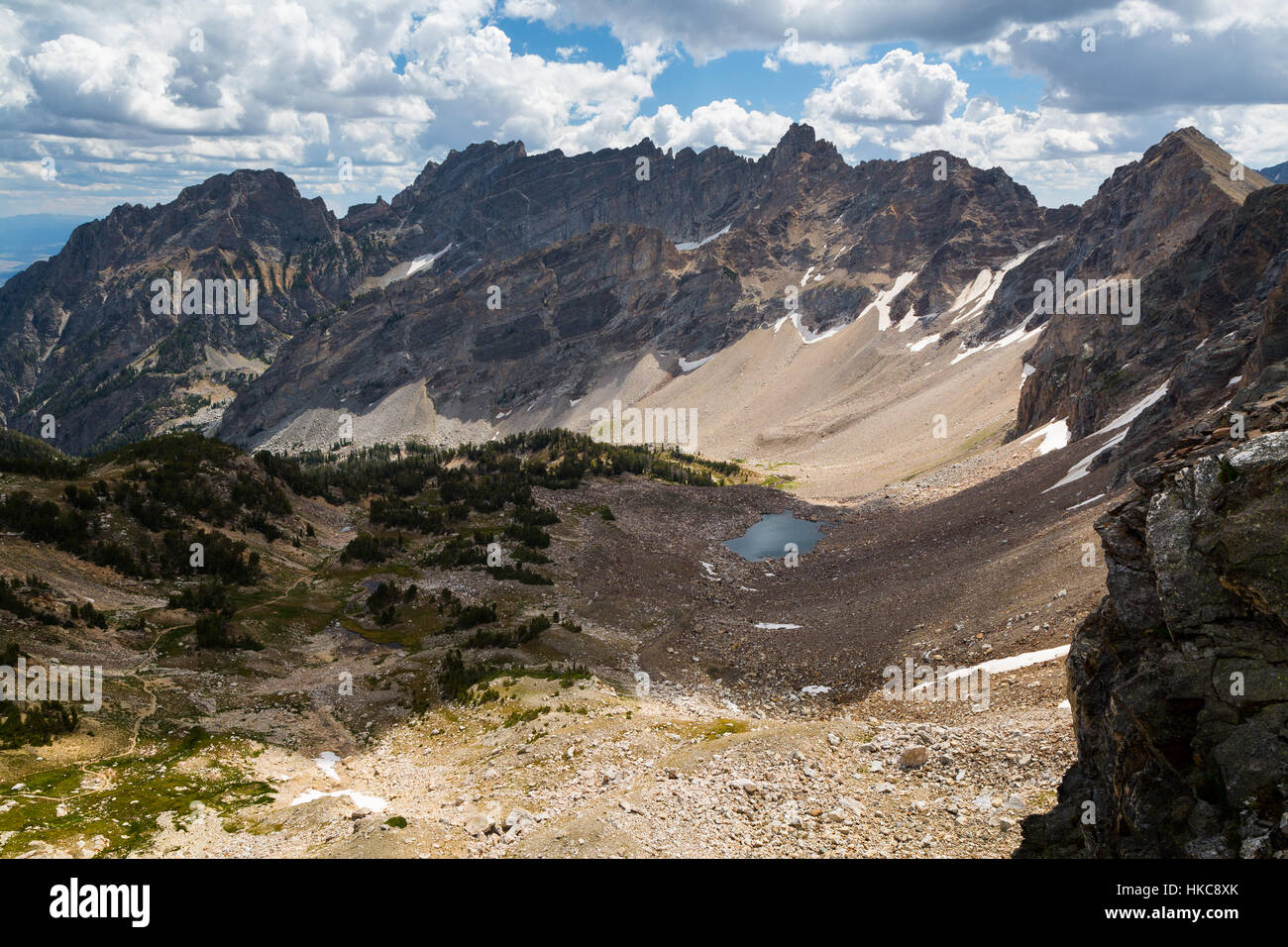 Nuvole raccolta su Upper Pennello Canyon e il pennello si dividono in Teton Mountains. Il Parco Nazionale del Grand Teton, Wyoming Foto Stock