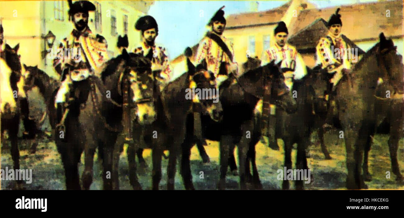 Il dipinto 'JuniiBrasoveni' del 1918 offre uno sguardo storico sull'arte rumena dei primi anni del XX secolo, riflettendo i temi culturali e artistici dell'epoca. Foto Stock