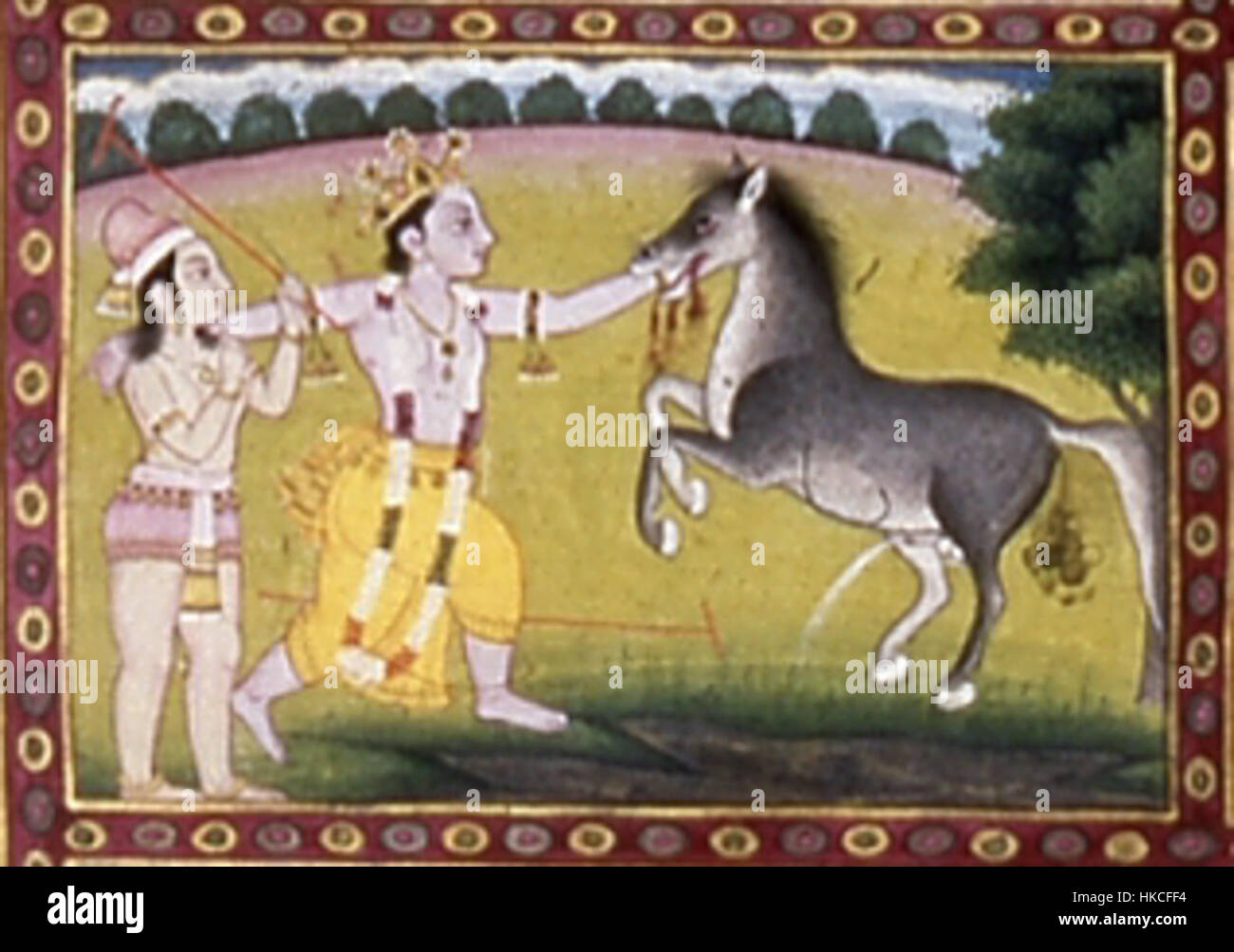 Questo dipinto raffigura l'antica storia indù della battaglia di Krishna con il demone Keshi. L'opera mostra la narrazione mitologica e gli attributi eroici di Krishna, un tema centrale nell'arte religiosa indù. Foto Stock