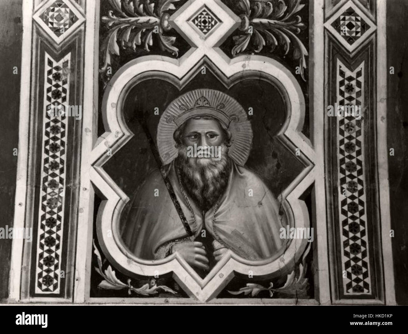 Questo motivo decorativo di Giotto mette in mostra il suo uso intricato e simbolico della geometria e del colore. Noto per i suoi contributi all'arte del primo Rinascimento, l'opera di Giotto dimostra una miscela di simbolismo religioso e stile decorativo. Foto Stock