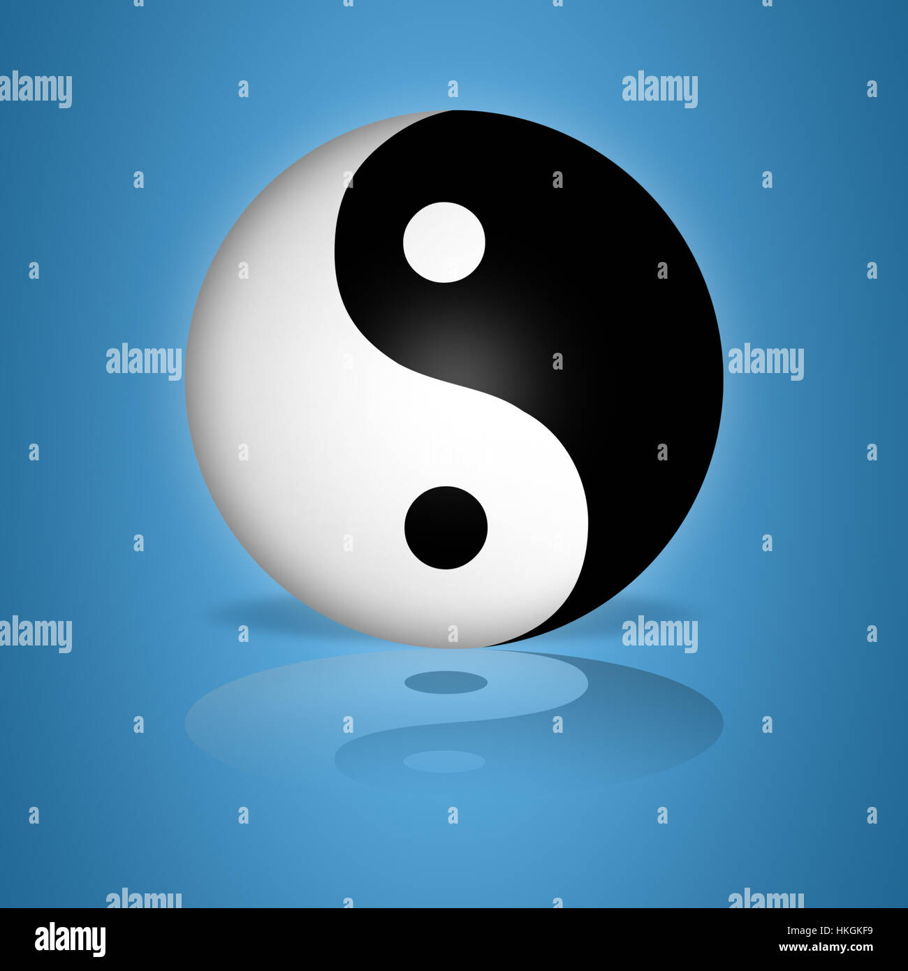 Yin Yang Globo rilassante su sfondo blu con la riflessione Foto Stock