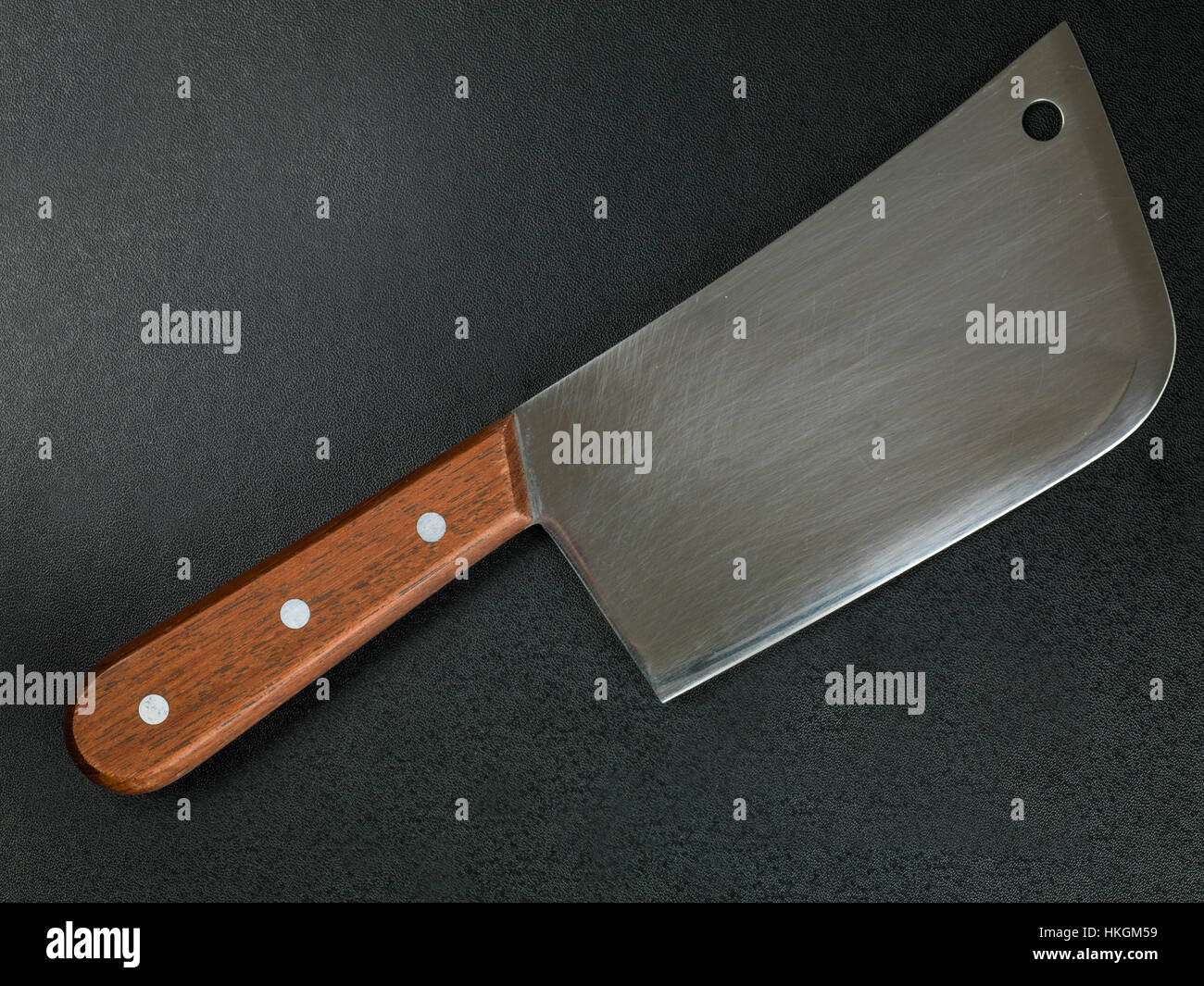 Il cibo del trinciapaglia o coltello mannaia arnese da cucina Foto Stock