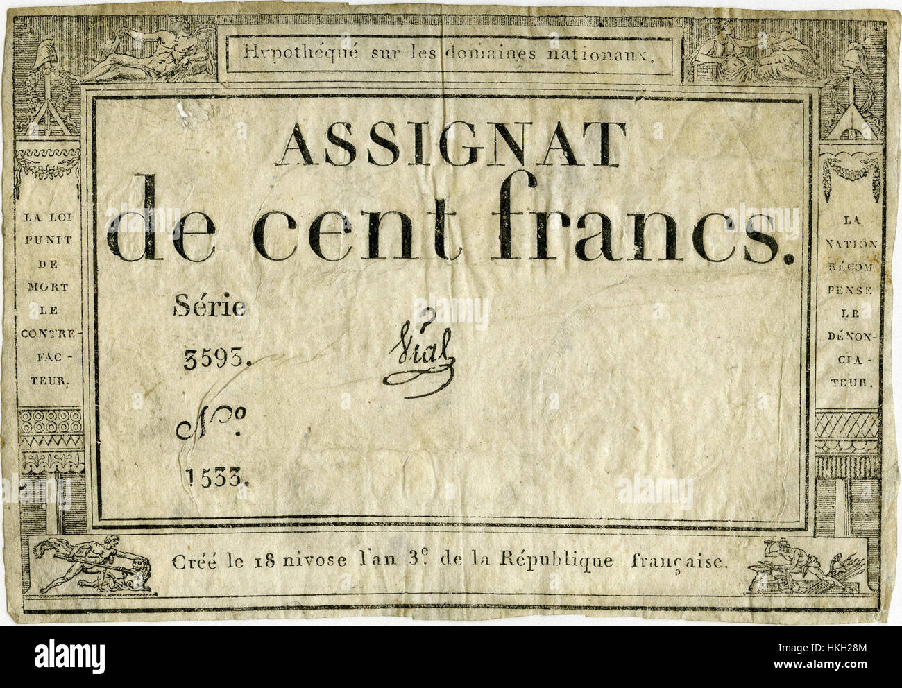 Un assegnat francese del XVIII secolo, una forma di moneta cartacea emessa durante la Rivoluzione francese, simboleggiando il tentativo della nazione di stabilizzare la sua economia con nuovi strumenti finanziari. Foto Stock