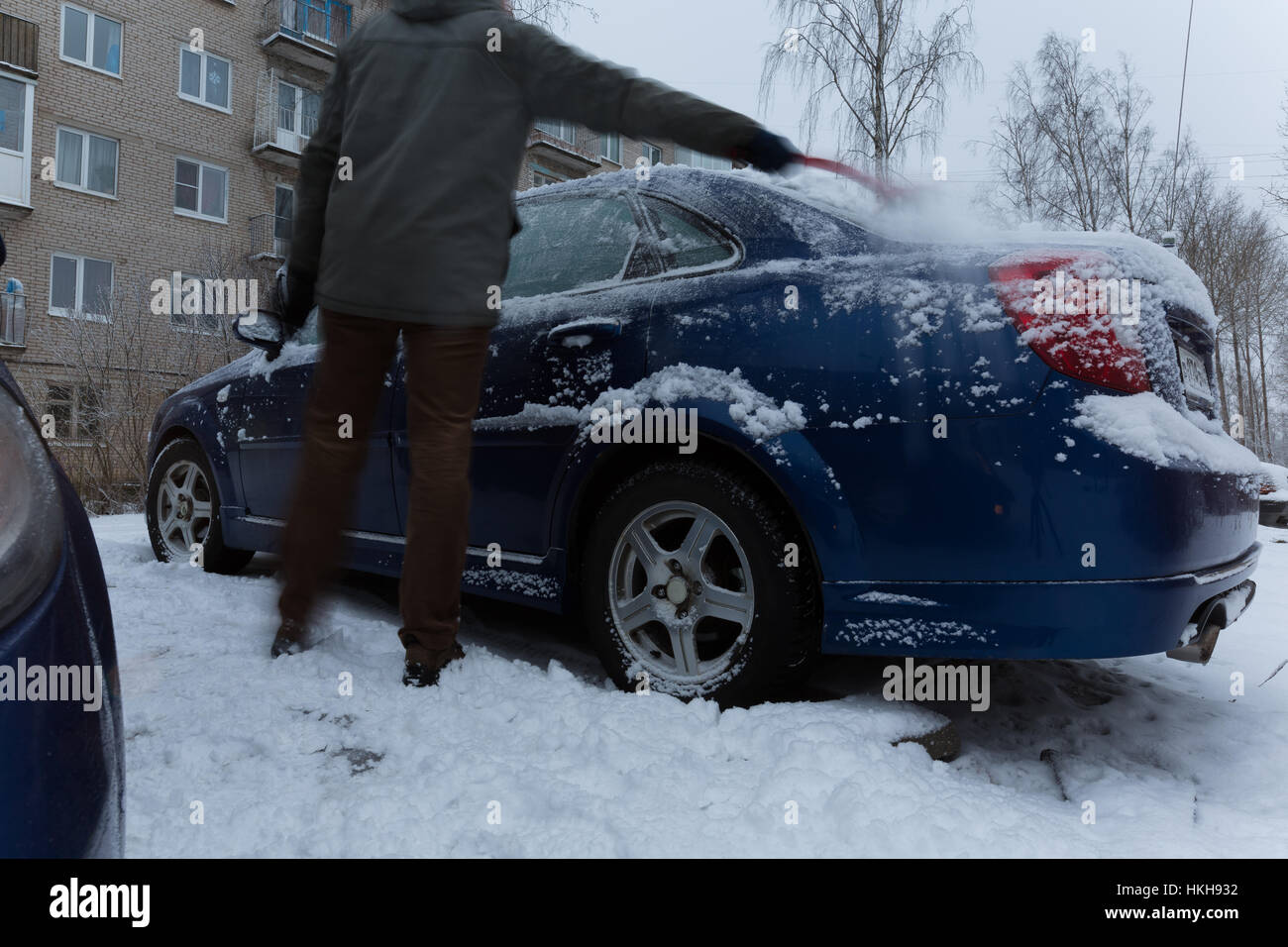 Sweep di neve da auto in inverno il time lapse video Foto Stock
