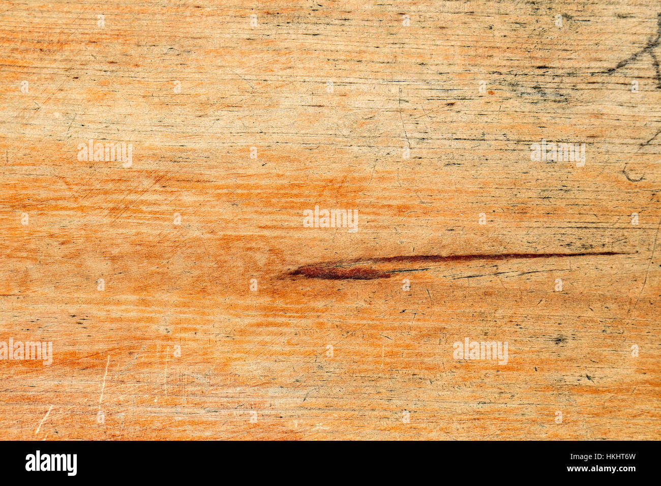 Chiudere il riempimento del telaio di un vecchio e graffiato asse di legno Foto Stock
