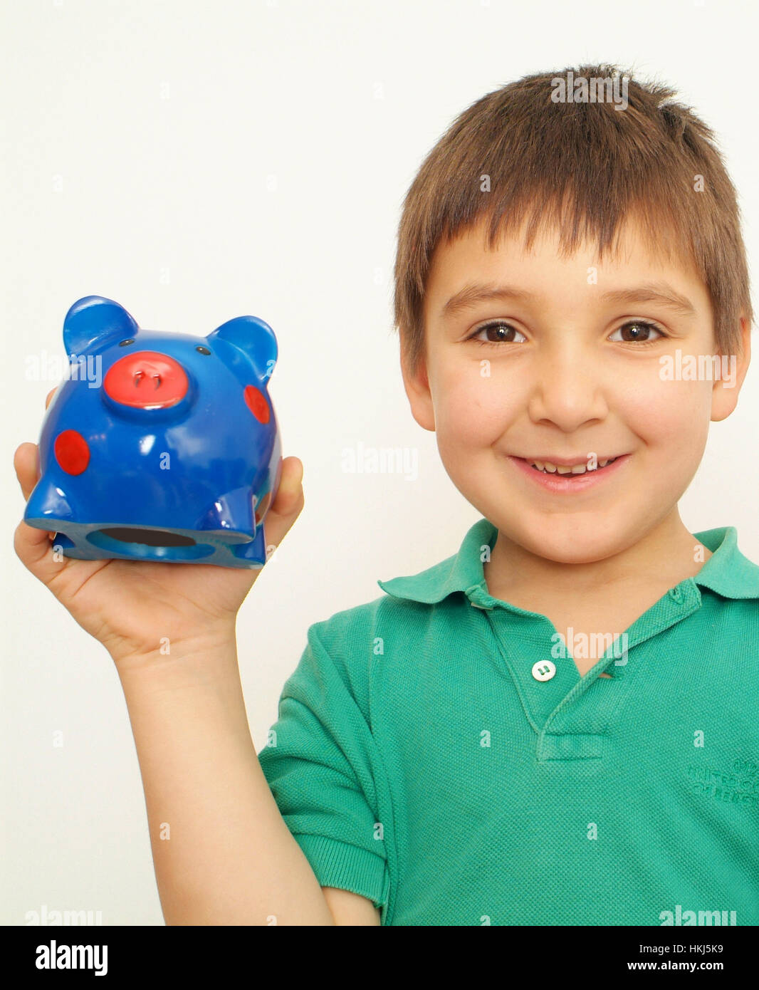 Ragazzo con piggybank Foto Stock
