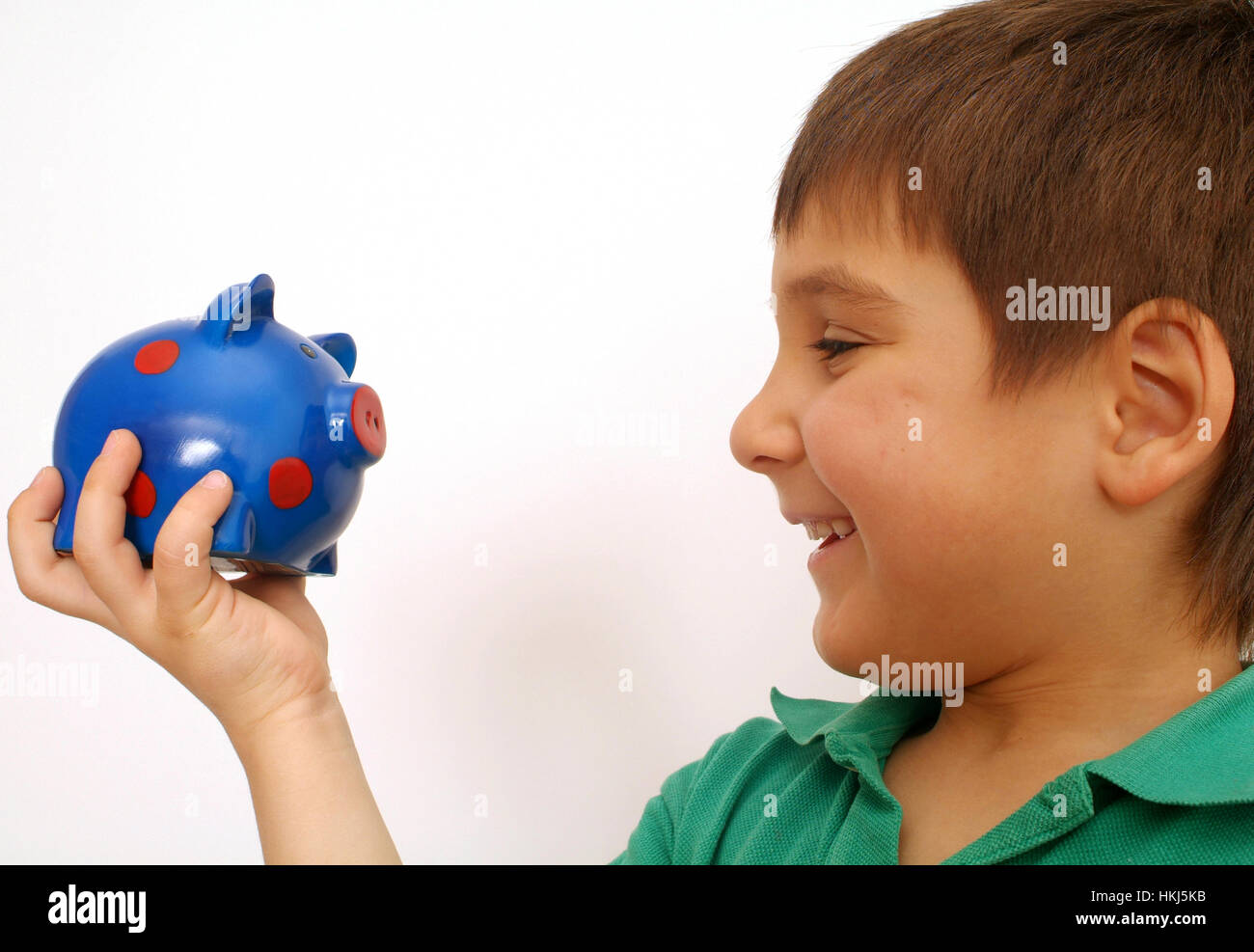 Ragazzo con piggybank Foto Stock