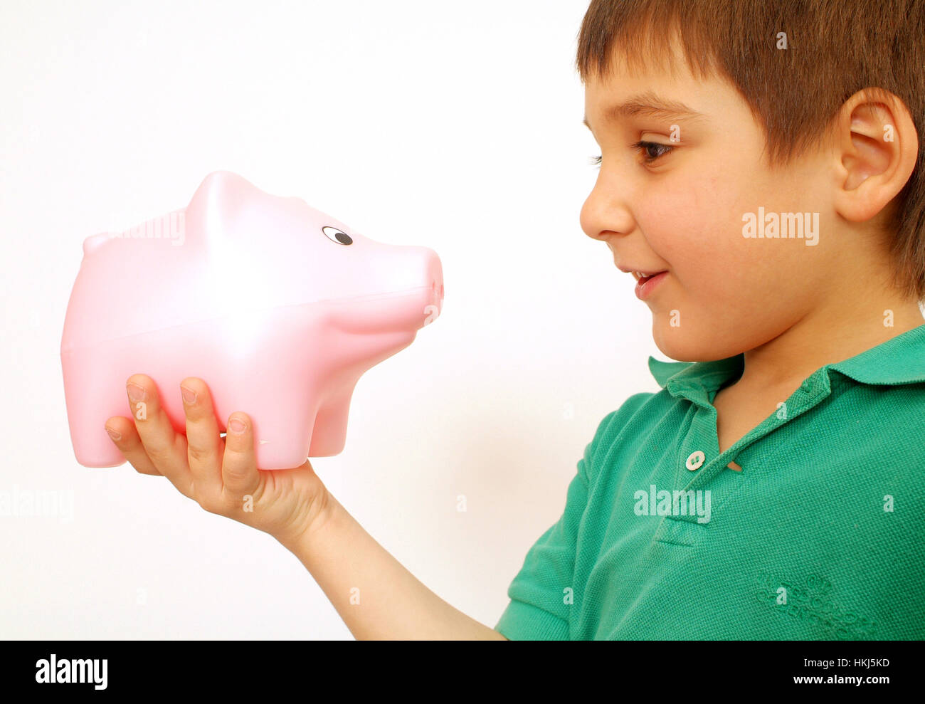 Ragazzo con piggybank Foto Stock