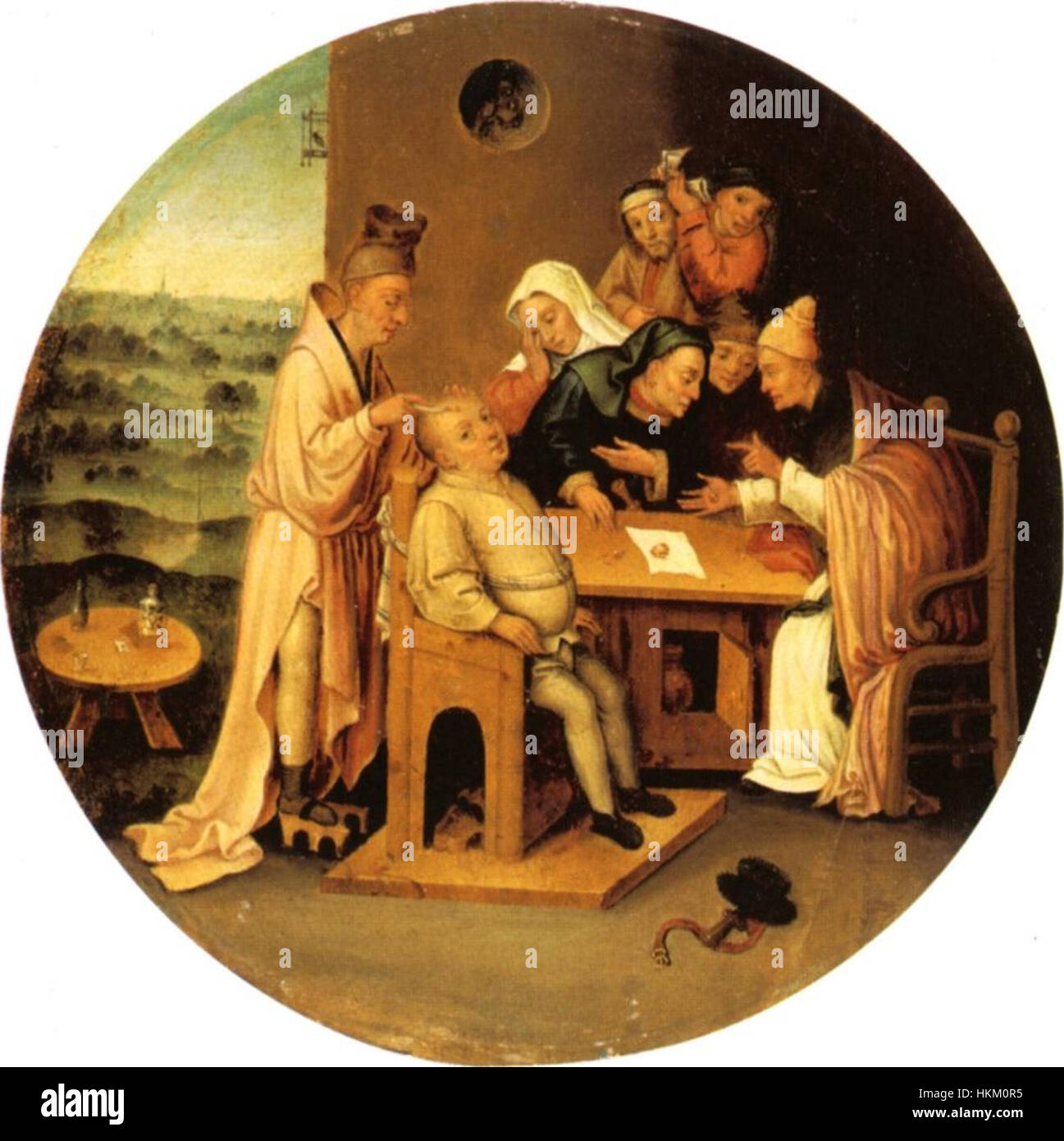 Questa opera, ispirata a Jheronimus Bosch, raffigura una scena surreale e simbolica in cui le rocce vengono rimosse dalla testa di una figura, forse suggerendo una forma di liberazione mentale o spirituale. L'influenza di Bosch sul surrealismo e sull'arte simbolica è notevole. Foto Stock