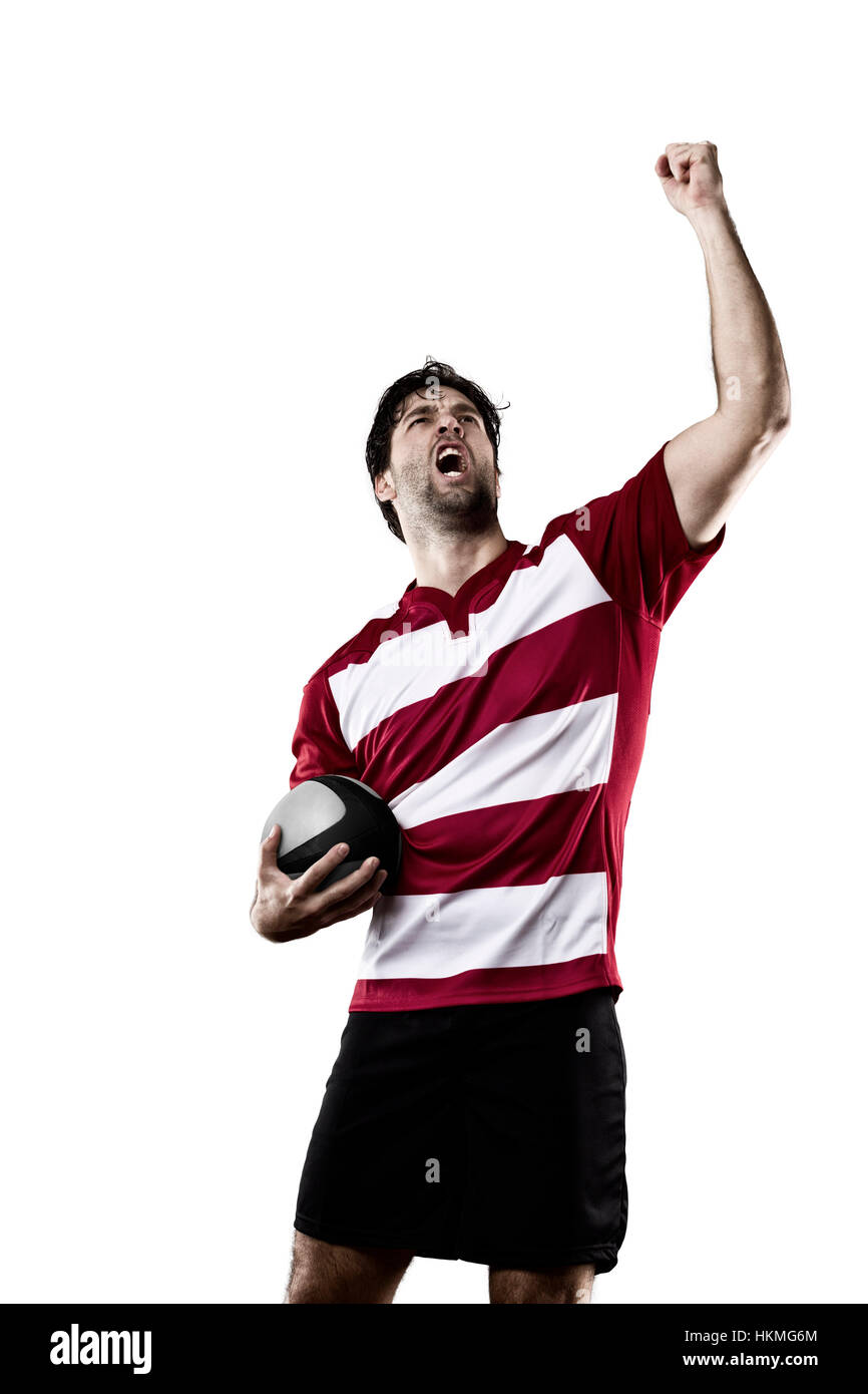 Giocatore di rugby in un rosso uniforme. Sfondo bianco Foto Stock