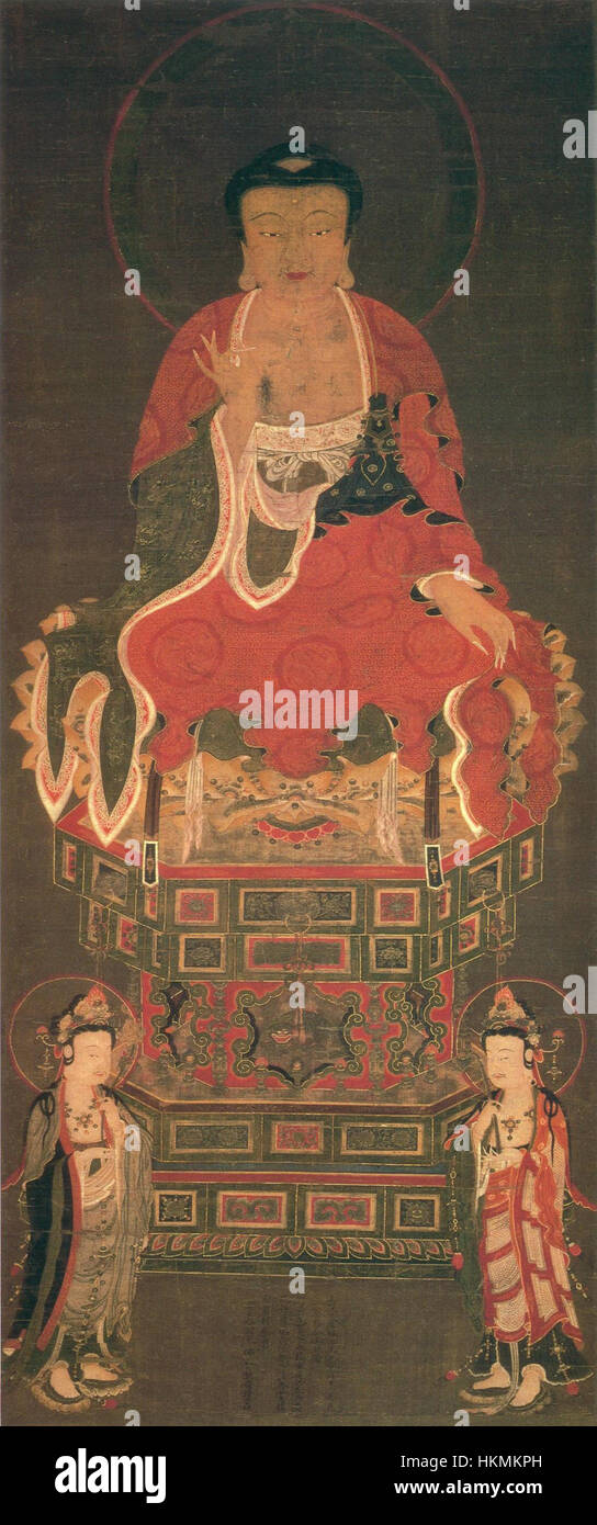 La Triade Amitabha, situata presso l'Uesugi Jinja, presenta un'importante rappresentazione del Buddha Amitabha, circondato da altri Buddha in una formazione sacra triade. Questa opera riflette l'iconografia buddista, con l'attenzione centrale su Amitabha, una figura chiave del Buddhismo Mahayana. La triade è un simbolo religioso significativo all'interno della tradizione, che enfatizza gli insegnamenti di Amitabha nelle pratiche spirituali orientali. Foto Stock