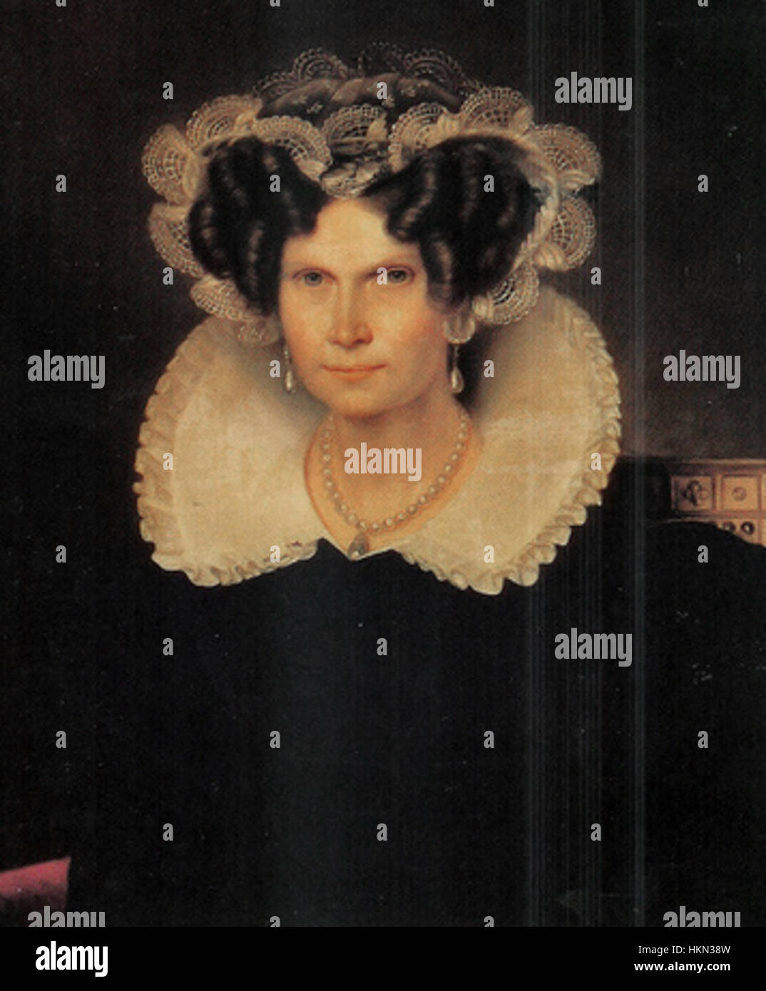 Questo ritratto cattura la regina Guglielmina dei Paesi Bassi, che regnò dal 1890 al 1948. Nota per la sua forte leadership durante la seconda guerra mondiale e la sua dedizione al suo paese, il regno di Guglielmina vide significativi cambiamenti politici e sociali nei Paesi Bassi. Il ritratto riflette il suo status di monarca e il suo ruolo nella storia olandese. Foto Stock