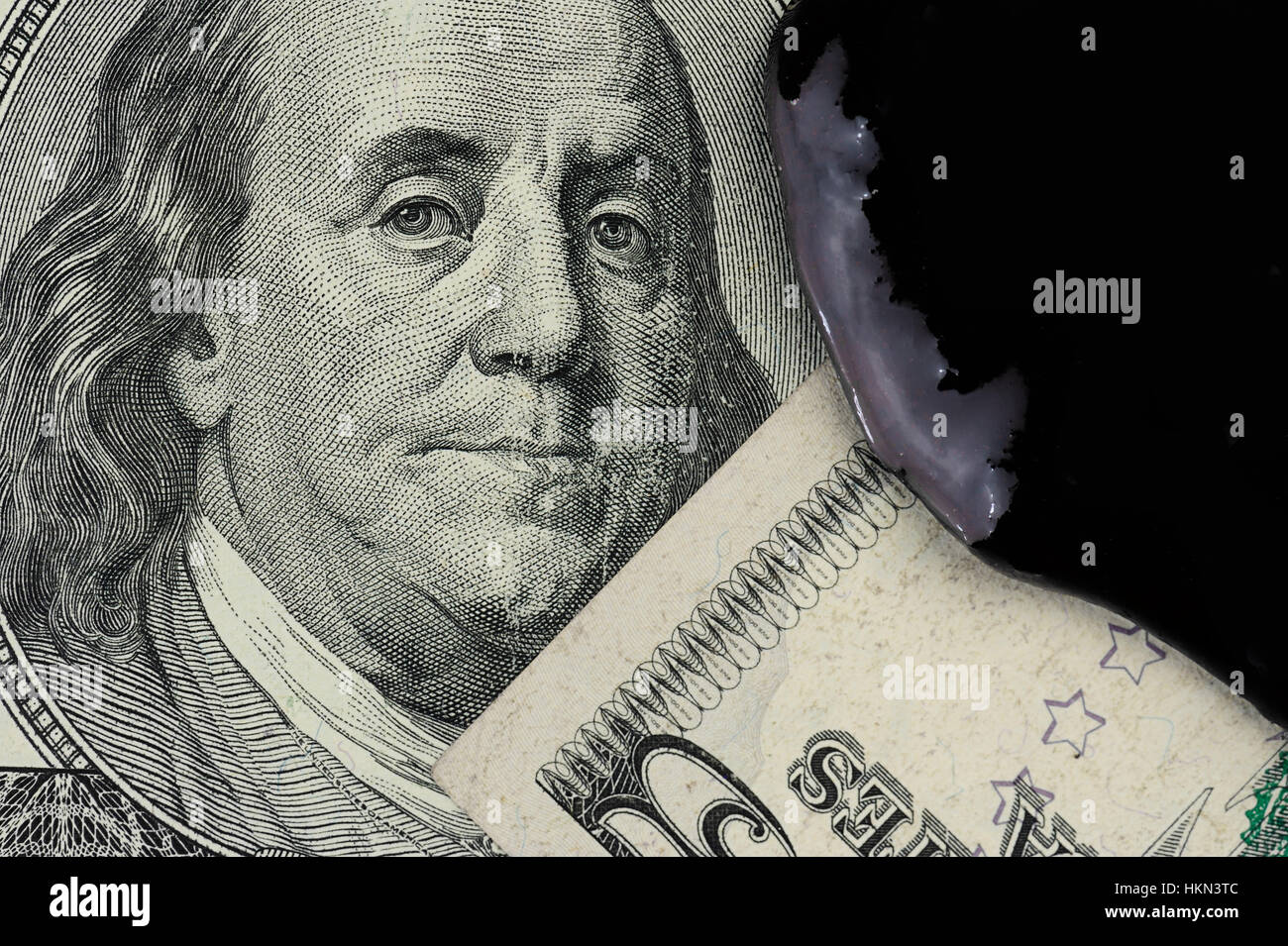 Benzina coperchio olio franklin dollar banconota Foto Stock