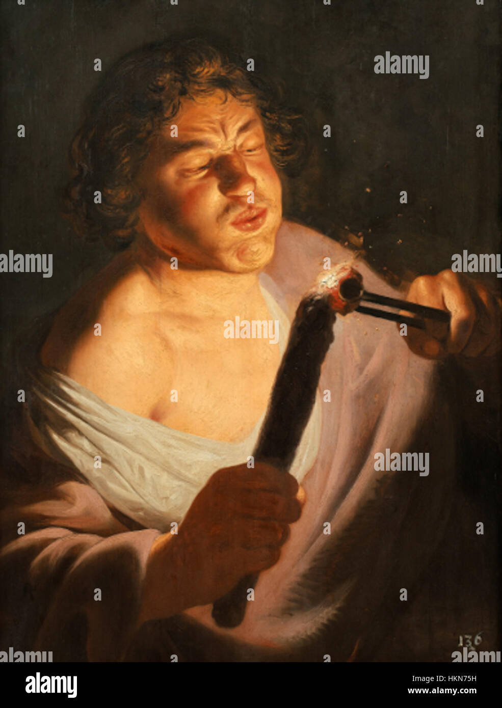 "A Youth Lighting a Torch" di Lievens è un dipinto ad olio che raffigura una giovane figura che tiene in mano una torcia. Questa opera d'arte storica mostra la maestria di Lievens nel catturare l'intensità della luce e la forma umana, riflettendo i temi della gioventù, della luce e del movimento. Foto Stock