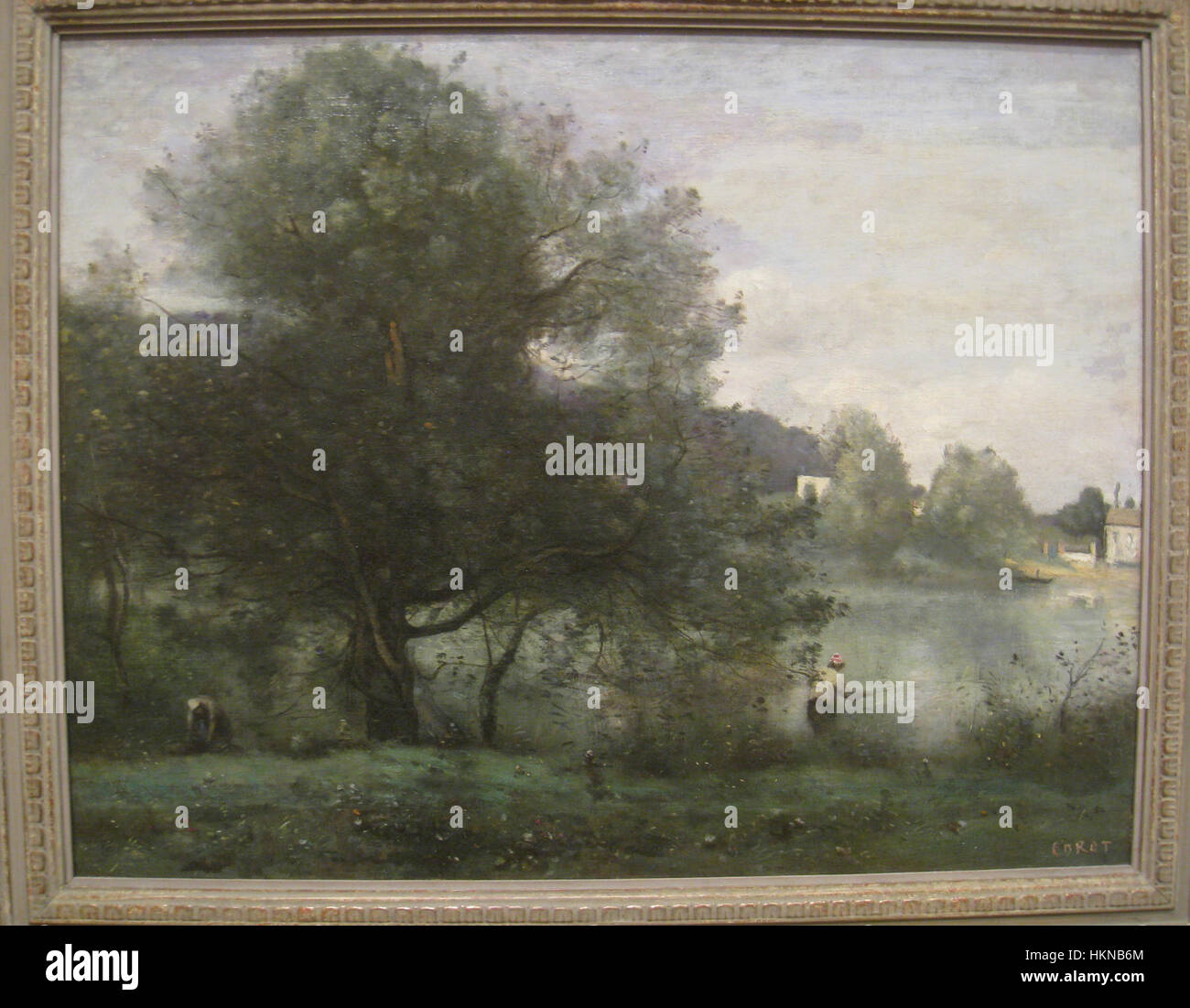 Jean-Baptiste-Camille Corot *An idyllic Spot at Ville-d'Avray* (1865-1870) è un dipinto ad olio che raffigura un paesaggio sereno vicino a Parigi. L'opera riflette la caratteristica miscela di realismo e impressionismo di Corot, catturando luce soffusa e profondità atmosferica. Foto Stock