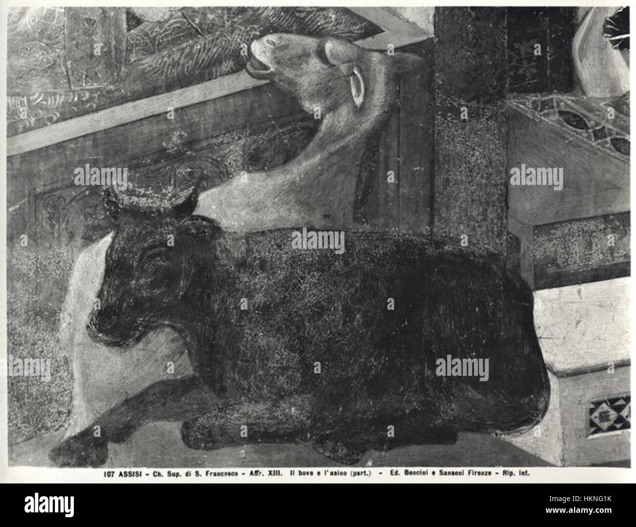 Questo dipinto, attribuito a Giotto, raffigura il *Presepe di Greccio*, il presepe creato da San Francesco d'Assisi nel 1223. La rappresentazione di Giotto è nota per la sua profondità emotiva e per la vivida rappresentazione della prima scena natalizia, mescolando significato storico e religioso. Foto Stock