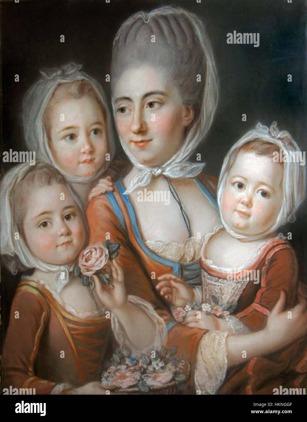 Questo ritratto del XVIII secolo raffigura Madame de Voyer con le sue tre figlie. Il dipinto cattura l'eleganza e la moda dell'aristocrazia francese durante il periodo, mostrando abiti dettagliati e un ambiente familiare formale. Foto Stock