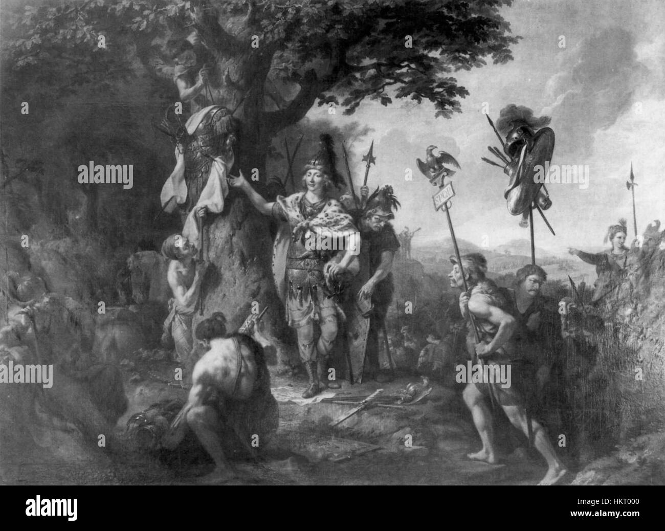 Der Triumph Hermanns, dipinto da Tischbein, illustra la vittoria di Arminio (Hermann) sulle legioni romane nel 9 d.C., un momento cruciale nella storia germanica. Il dipinto ritrae Arminio in trionfo, simboleggiando la sconfitta delle forze romane nella foresta di Teutoburgo. Questa opera d'arte storica sottolinea l'importanza della battaglia nel plasmare l'identità e la resistenza germanica. Foto Stock