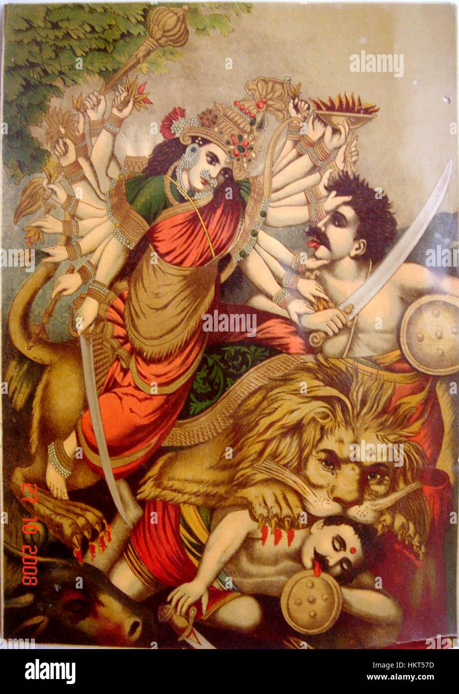 Durga Mahishasura-mardini è una potente rappresentazione della dea Durga nell'arte tedesca, raffigurante la sua vittoria sul demone di bufalo Mahishasura. L'opera d'arte, spesso una miscela di stili tradizionali e moderni, mostra vibranti raffigurazioni della mitologia in olio, acquerello o schizzo. Mette in risalto l'iconografia antica ed è considerato un capolavoro della storia dell'arte. Foto Stock