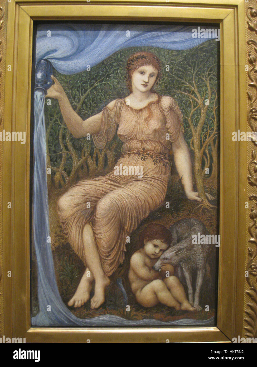 'Earth Mother' (1882) di Edward Burne-Jones è un dipinto allegorico che rappresenta la fertilità e le qualità nutritive della natura. Burne-Jones, una figura di spicco della Fratellanza Pre-Raphaelita, spesso esplorava temi della mitologia e della bellezza idealizzata nelle sue opere. Foto Stock