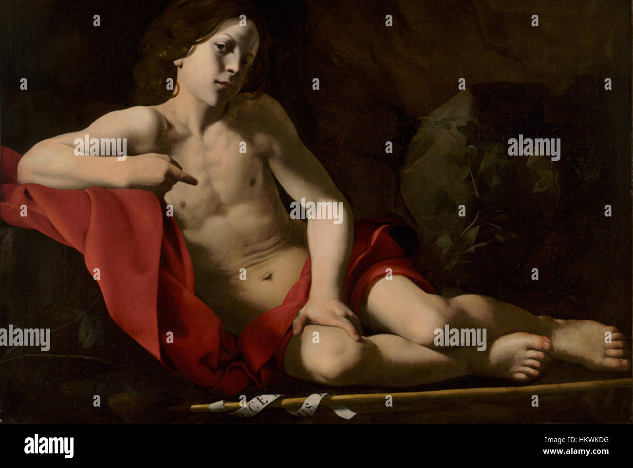 Giovanni Battista Caracciolo "il giovane San Giovanni nel deserto" illustra la figura biblica di San Giovanni Battista, sottolineando la sua solitaria esistenza nel deserto. Il dipinto trasmette un senso di isolamento e di riflessione spirituale. Foto Stock