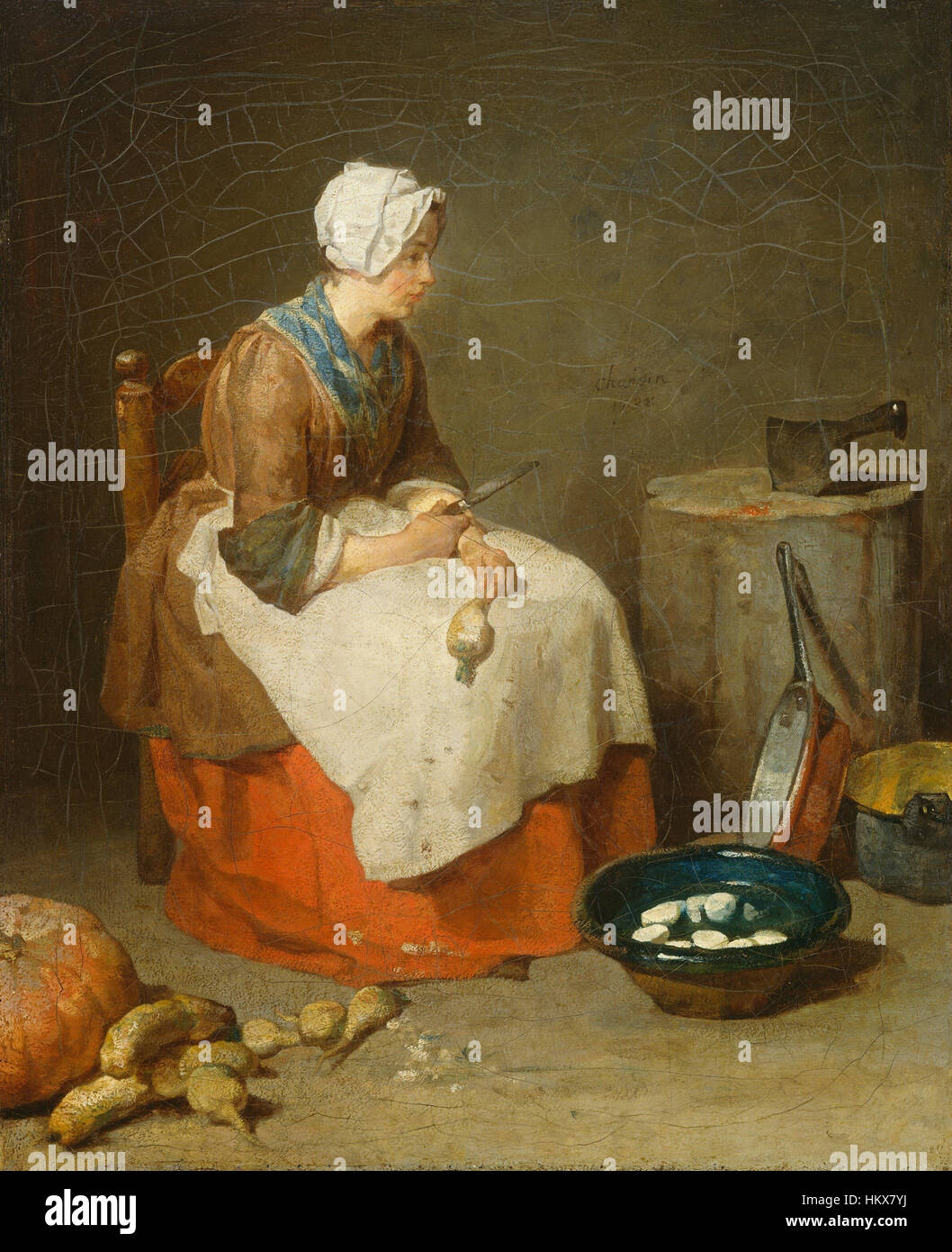 Il dipinto di Jean-Baptiste Simeon «The Kitchen Maid» è un dipinto di genere che raffigura una donna impegnata nel lavoro domestico. Il pezzo mette in evidenza i ruoli mondani ma significativi che le donne hanno svolto nei doveri domestici durante il XVIII secolo, mostrando attenzione ai dettagli e al realismo. Foto Stock