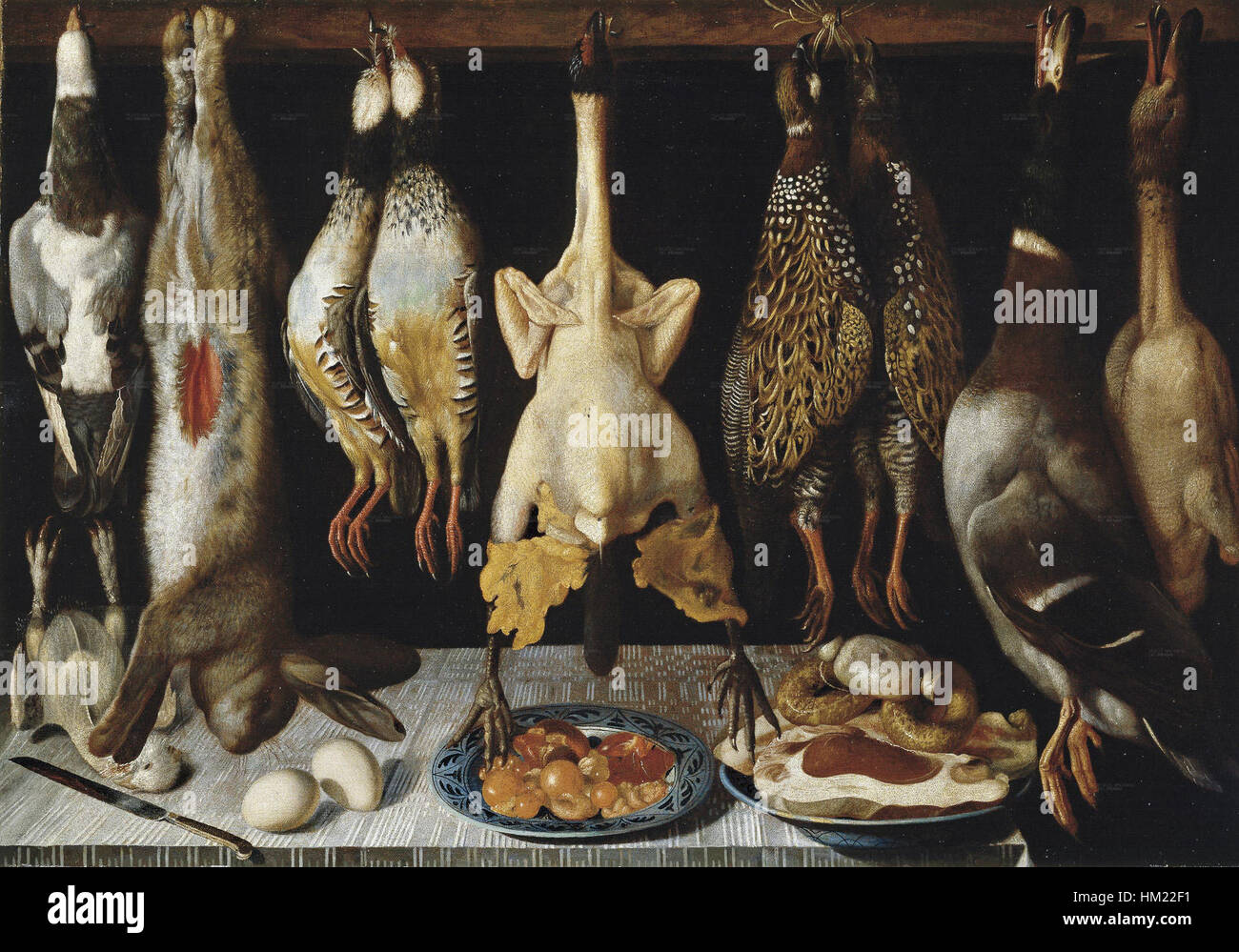 Il dipinto di natura morta "Bodegón Aves y Liebre" di Hiepes cattura una disposizione dettagliata di uccelli e lepre. L'opera è rappresentativa della natura morta spagnola del XVII secolo, evidenziando l'abilità dell'artista nel rendere dettagli e texture naturalistici. Foto Stock